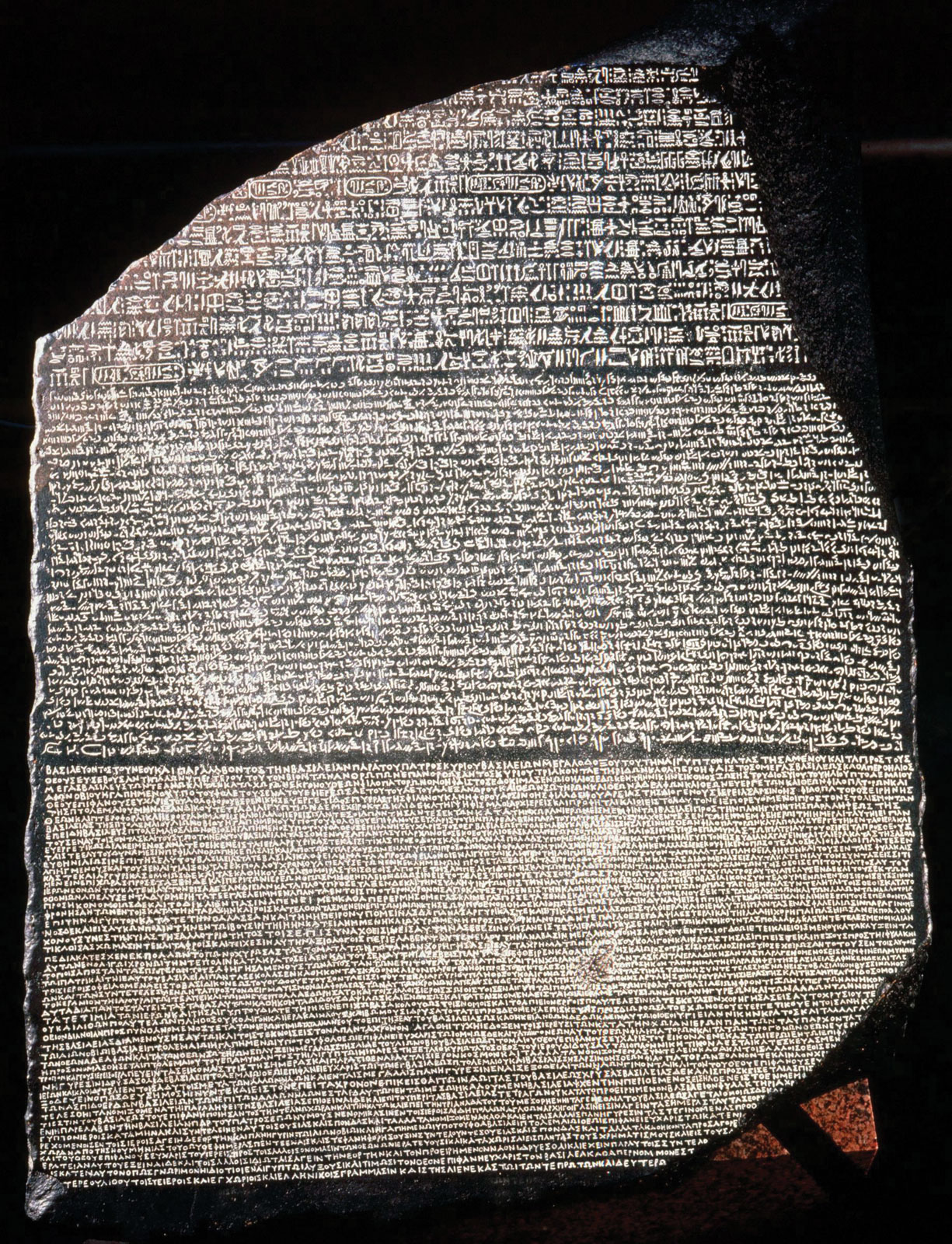 The Rosetta Stone basalt slab from Fort Saint-Julien Egypt 196 BC in the British Museum London